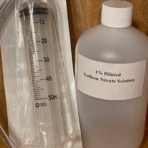 A bottle labeled 17% ethanol with a graduated cylinder nearby.